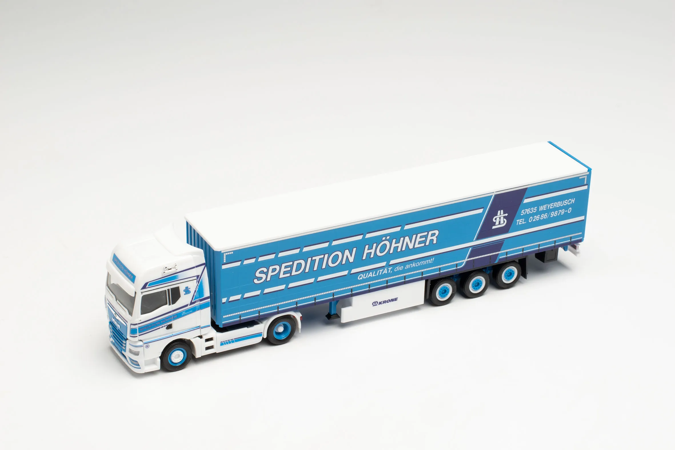 Herpa 314329 MAN TGX GX Gardinenplanen-Sattelzug Höhner