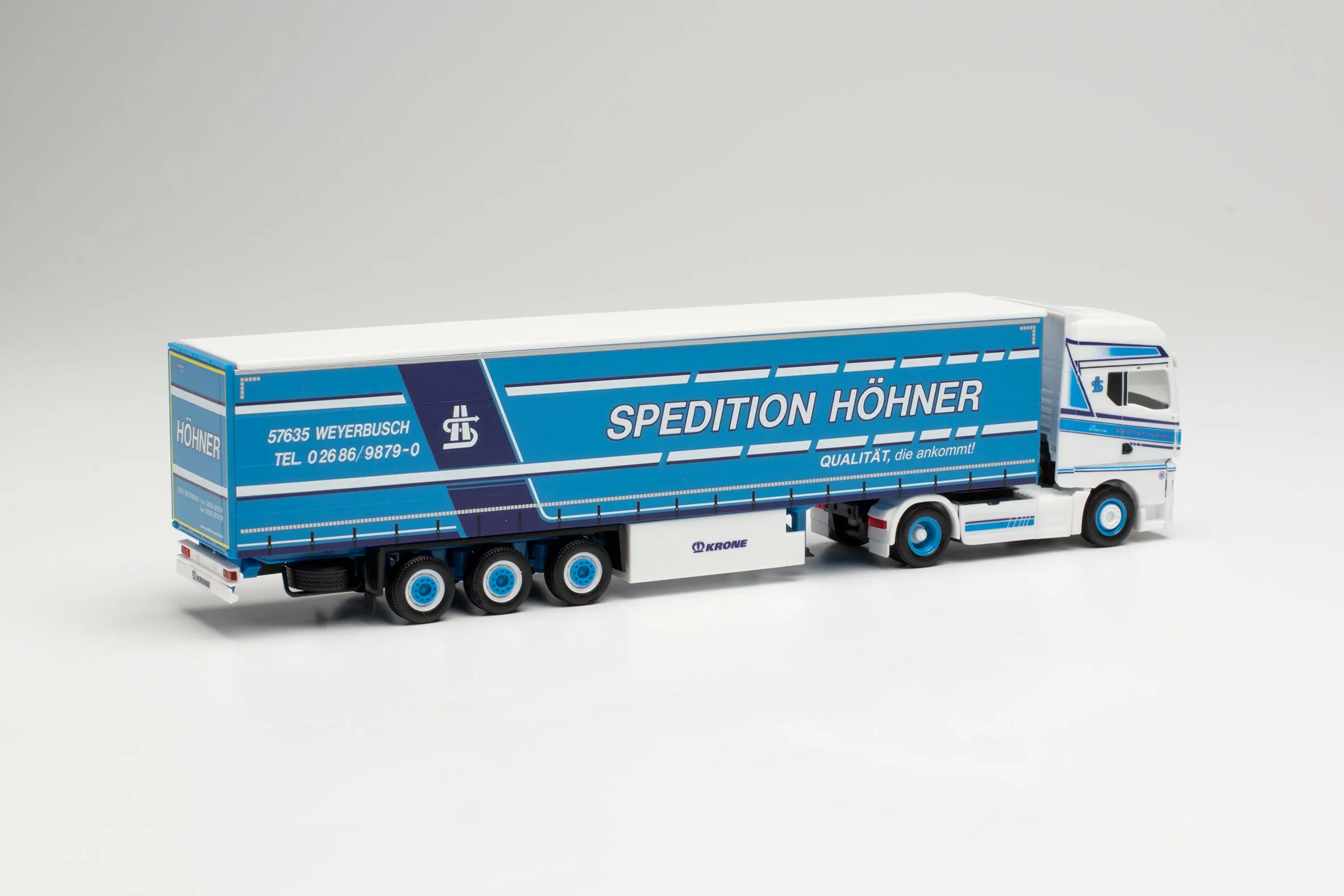 Herpa 314329 MAN TGX GX Gardinenplanen-Sattelzug Höhner